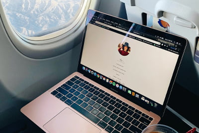 Laptop on a tray while on a plane